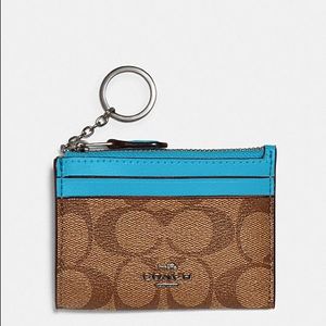 MINI SKINNY ID CASE IN SIGNATURE CANVAS